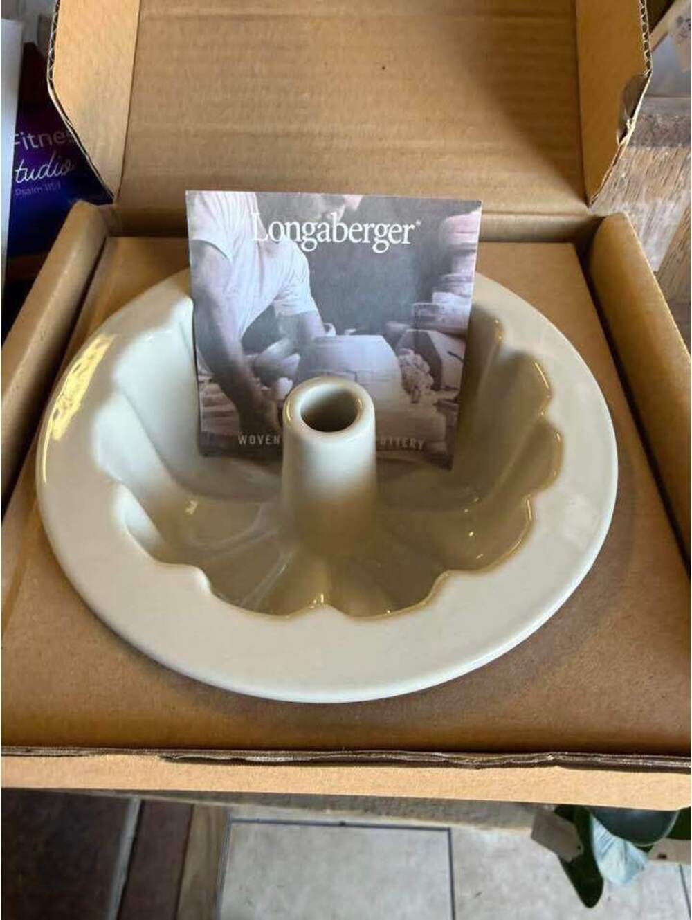 Longaberger Pottery Bundt pan in Ivory is a retired piece featuring a traditiona